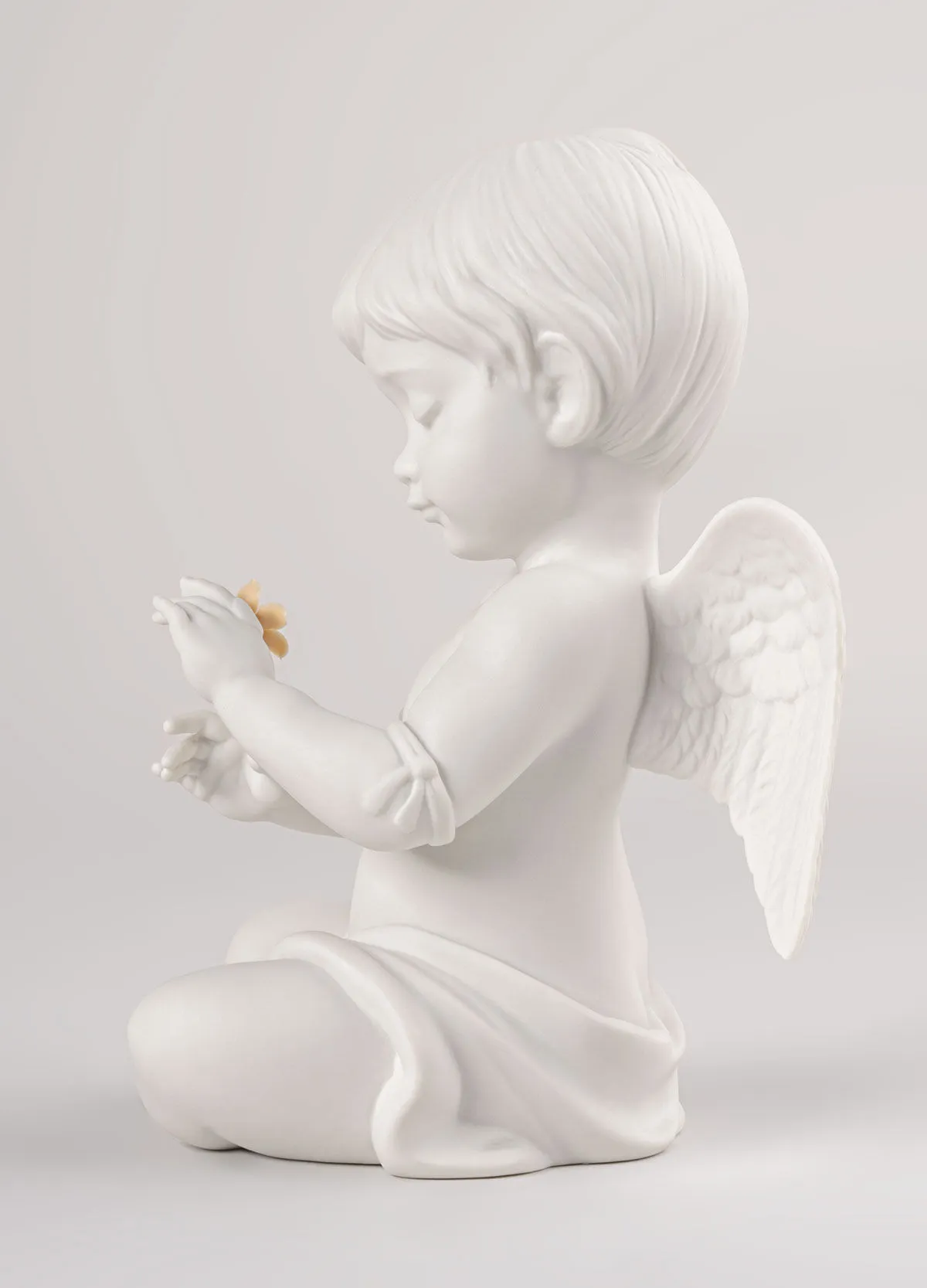 LLADRÓ Scultura Angelo con fiore